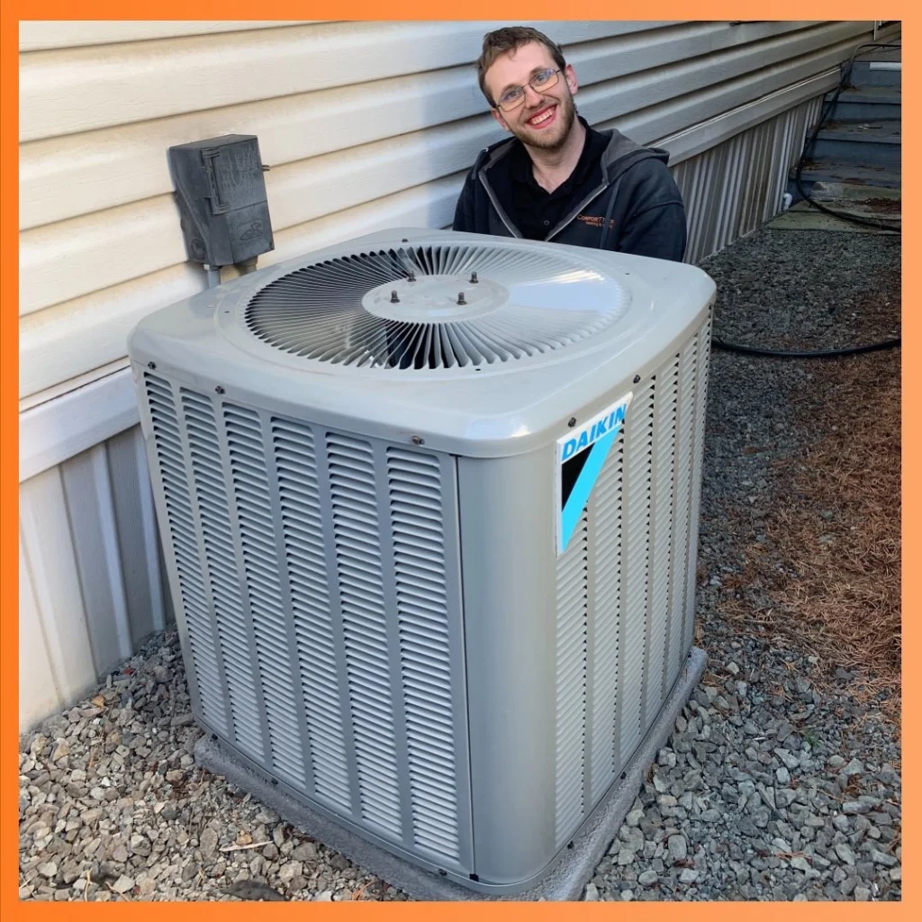 Comfort Tech technician working on a Daikin Heat Pump