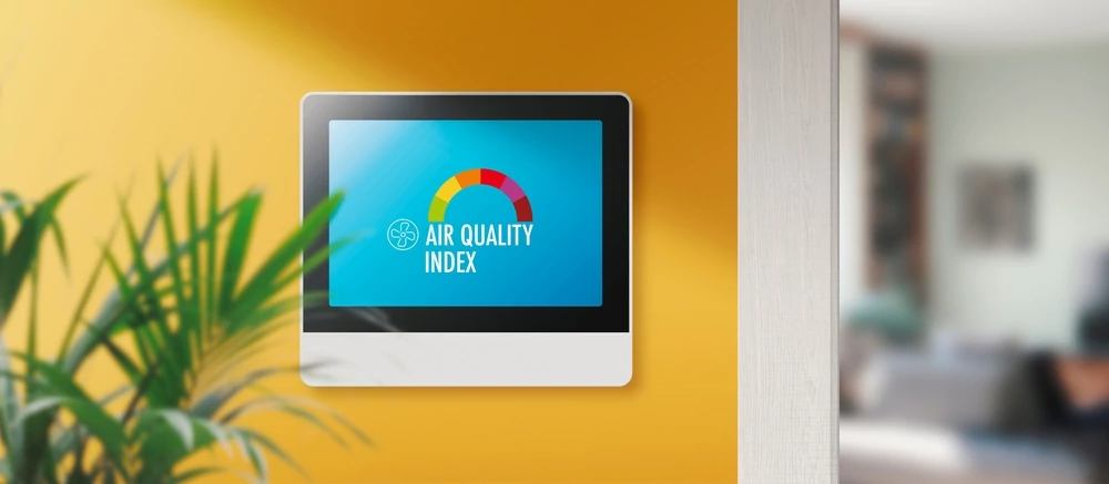 Smart thermostat showing indoor air quality index